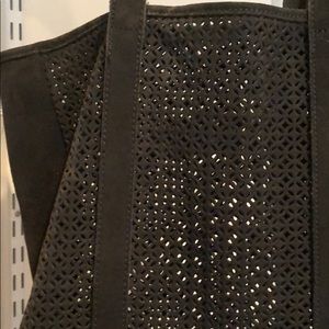 Suede laser cut tote bag.